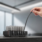 SooPii H1 charging station close-up — magnetic cable snap mechanism