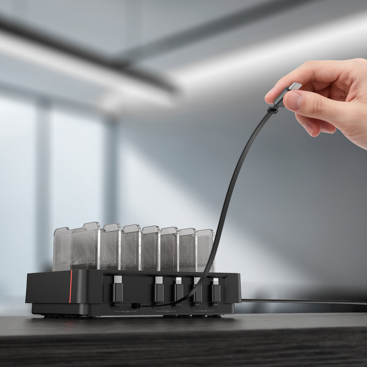 SooPii H1 charging station close-up — magnetic cable snap mechanism